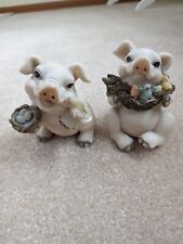 Unusual set of 2 cute little pigs, one with bird and nest, two with baby birds picture