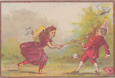 D1551 VICTORIAN TRADE CARD PRODUCT ?? CHILDREN PLAYING picture