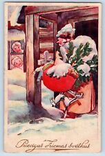 Latvia Postcard Christmas Santa Claus Brown Robe With Sack Of Toys Winter Scene picture