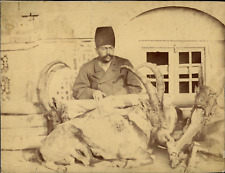 One of the Mass'oud Mirza Zell-e Soltan's (1850-1918) Men beside hunte picture