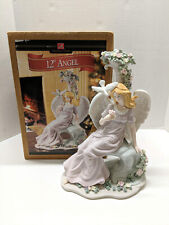 Vintage Porcelain Angel Sculpture with Dove Sitting on Her Wing From 1990's picture