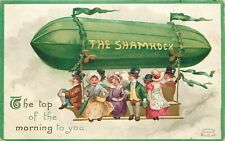 Embossed St. Patrick's Day Postcard Clapsaddle People Ride in Zeppelin Shamrock picture
