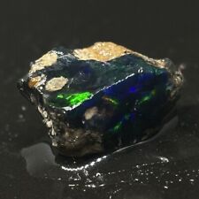 Black Welo Ethiopian Rough Opal Cutter With Beautiful Contrast Of Fires picture