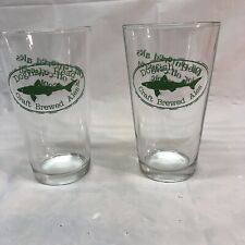 Lot of 2 Dogfish Head Brewing Pint Glasses Off Centered Ales Green Fish picture