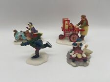 Lot of 4 O'Well Christmas Village Figures Skater Hot Dog Cart Girl Pushing Pups picture