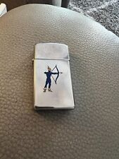 RARE VINTAGE ZIPPO 1979 SLIM CHROME WITH ARCHER ON FRONT picture