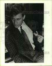1989 Press Photo Man models Marithe et Francois Girbaud leather money vest picture