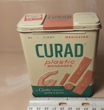 Vintage 60s? Curity Curad Medicated Plastic Bandage Tin with raised design picture