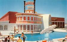 THE SHOWBOAT Casino Swimming Pool LAS VEGAS Roadside c1950s Vintage Postcard picture