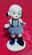 Vintage Blue & White Porcelain Skating Boy And Girl Figurines picture