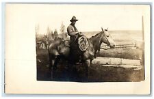 c1910's Cow Cattle Rancher Horse Ride Near Barn RPPC Photo Antique Postcard picture