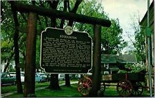 Postcard WI  Stoughton Wisconsin sign with wagon picture