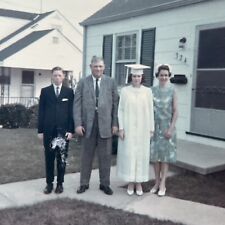1960s FOUND VTG photo TEEN GIRL HIGH SCHOOL GRADUATION suburban lawn family picture