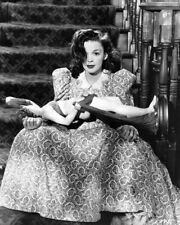 Judy Garland sits on stairs holding statue The Harvey Girls 1946 5x7 photo picture