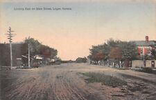Logan Kansas~East on Main Street~Grass Patch on Dirt Road~Stores~1908 Handcolor picture
