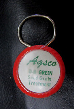 Vintage 1970s Agsco DB Green Seed Grain Treatment Red Plastic Steel Key Ring Fob picture