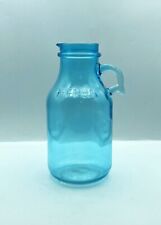Turquoise Glass Half Gallon Moonshine Bottle picture