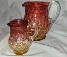 Pair of Large & Small Antique Amberina Pitchers, Reeded Handle, Reverse Coin Dot picture
