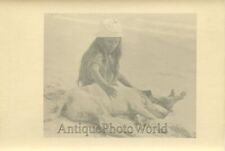 Cute girl posing with sleeping Pit Bull dog on beach antique photo picture