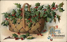 Christmas woven basket holly Old English font c1910 MAY CHAPMAN vintage postcard picture