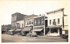 Plainwell MI Storefronts Street Old Cars RPPC Postcard picture