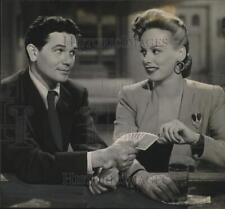 1944 Press Photo John Garfield & Faye Emerson costar in movie scene - tua45836 picture