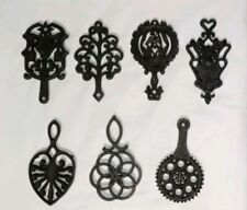 WILTON 7 Cast Iron Trivets assorted - Small approx. 3