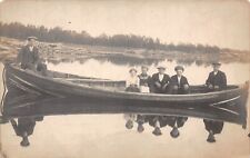 RPPC Family In A Very Long Canoe Great Refection on Water 1920s photo Postcard picture