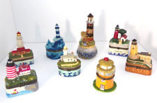 8 Piece Lot Lighthouse Collectible Trinket Boxes in very good condition picture