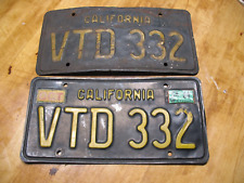 CALIFORNIA LICENSE  PLATES   1963  BLACK YELLOW  STEEL  w/ 84 STICKER picture