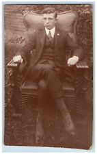 Young Man Postcard RPPC Photo Sitting In Tiger Arts Crafts Leather Chair c1910's picture
