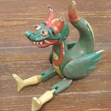 Carved wooden toy Dragon from Indonesia hand painted marionette puppet style picture
