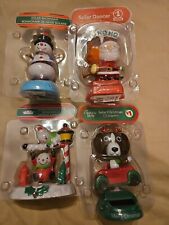 Lot Of 4 Solar Powered Christmas Themed Bobbleheads  picture