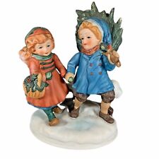 Vintage Avon Sharing the Christmas Spirit Porcelain Figurine 1981 1st in Series picture
