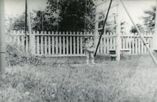 KJ435 Vtg Photo SMALL CHILD ON BACKYARD SWINGSET, PICKET FENCE c Early 1900's picture