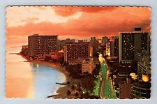 Waikiki HI-Hawaii, Night Falls Kalakaua Ava, Pacific Ocean Vintage Postcard picture