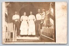 RPPC People Stand On Porch w/ Patriotic AMERICAN Flags Theme ANTIQUE Postcard picture