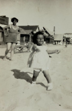 Baby Walking On Beach With Mother Behind Watching B&W Photograph 2.25 x 3.5 picture