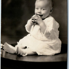 c1910s Smiling Baby Table Portrait RPPC Eating Apple Cute Child Real Photo A260 picture