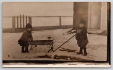 RPPC Cute Children With Wagon in Snow Hats Gloves Coats Postcard E29 picture