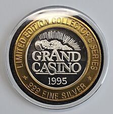 1995 .999 Silver Grand Casino Gaming Token in a Capsule picture