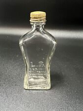 Vintage L.B LAB.INC Hollywood embossed glass medicine bottle  metal lid 1.25oz picture