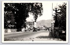 c1940s~Calistoga California CA~Downtown~Lincoln Ave~Stores~Cars~RPPC Postcard picture