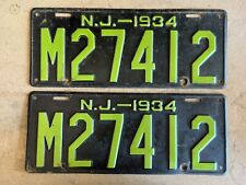 1934 NEW JERSEY LICENSE PLATE PAIR #M27412 NEON GREEN ON BLACK picture