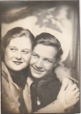 VINTAGE PHOTO BOOTH - ATTRACTIVE, AFFECTIONATE YOUNG COUPLE, CUDDLING picture