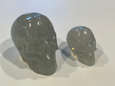 Matched pair Matallic Blue/Purple/Pink Sparkly Solid Resin Skulls.   picture