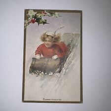 Vintage Christmas postcard child sledding picture