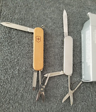 Victorinox rare retired Ambassador with wood scales & metal stainless guilloché picture
