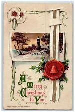 c1910's Christmas Holly Berries Bell Flowers House River Embossed Postcard picture