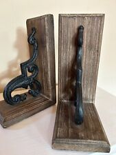 Vintage Pair Of Cast Iron and rustic wood Bookends picture
